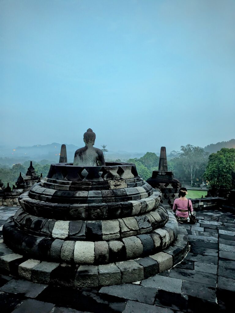 Borobudur stone stupas Buddha statues dawn