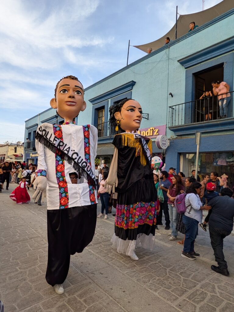 Guelaguetza pre-parade papier mache giant figures Oaxaca
