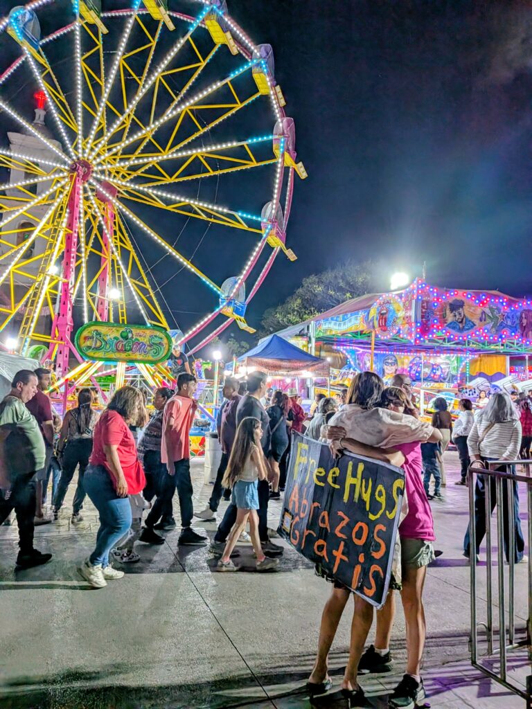 free hugs sign fiestas Mexico crowd