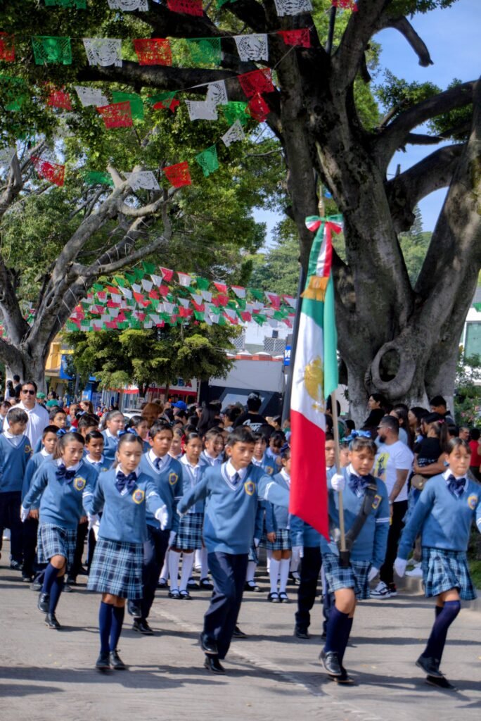Local school children marching in Chapala Independence Day parade